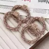 Outono e Inverno 2024 Novo Cordão para Cabelo Torcido de Alta Elasticidade Espesso com Logo de Urso Trançado para Meninas Elásticos Duráveis para Cabelo Acessórios de Cabelo
