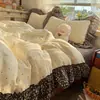 Conjunto de cuatro piezas de algodón y lino estilo francés girly Ins, versión coreana Clase A con encaje y estampados florales, juego de funda de edredón de tres piezas estilo pastoral de algodón puro