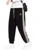 Pantalones deportivos de pana pesada Pantalones de chándal casuales para hombre Otoño/Invierno con forro polar Engrosados talla grande Pantalones color block holgados