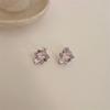 Pendientes de lujo con diseño de corazón en polvo de diamante y ojo de gato para niña, con hebilla de tornillo y elegantes pendientes combinables.