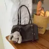 Bolsa de axila retrô de nicho de alta qualidade transfronteiriça bolsa feminina nova versão coreana bolsa de ombro casual para o dia a dia bolsa Boston