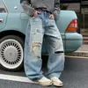 Jeans anchos de estilo callejero retro americano a la moda, lavados y desgastados, sueltos y casuales, de largo completo para hombre