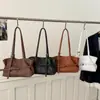 Bolso Tote Casual Retro para Viajeros 2025 Invierno Nuevo Estilo Textura de Alta Gama Elegante Bolso de Hombro/Axila de Lujo Ligero