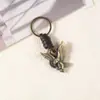 Llavero creativo para hombres y mujeres, pequeño regalo, aleación, lindo animal de aleación, llavero de cuero tejido vintage, llavero