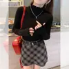 Camisa base súper elegante con dobladillo con volantes para mujer, otoño e invierno, ropa interior estilo Chanel, suéter de punto blanco con cuello semi alto, jersey de moda