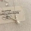 Collar de plata con perla en forma de gota estilo francés para mujer, nuevo modelo 2026, cadena de clavícula de nicho de alta gama, accesorio de moda y versátil