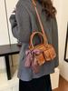Bolso de mano estilo bolos de estilo retro, estilo Boston, de alta gama, para mujer, de un solo nicho, de estilo extranjero.