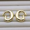 Pendientes Trendy Europeos y Americanos de Rosca Giratoria, Exquisitos Pendientes de Lujo Ligero, Brillantes Pendientes Transfronterizos con Baño de Oro Real de Amazon
