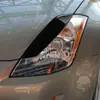 Adecuado para Nissan Nissan Nissan 350z fibra de carbono real negro piano ceja de luz negro brillante decoración de modificación de coche
