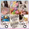 Venta de liquidación de gomas para el pelo, accesorios para el pelo y pinzas para el pelo; ofertas al por mayor de Yiwu