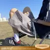 Pantalones Cortos Deportivos Rayados para Hombre, Verano Finos de Corte Holgado, Pantalones Casuales para Adolescentes, Estilo Americano Moderno, Pantalones Cortos de Cinco Puntos de Secado Rápido