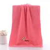 Toalla de vellón de coral suave absorbente toalla de vellón de coral bordada venta al por mayor de fábrica toalla facial bordada lisa toalla facial