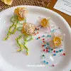 Brincos de Tarraxa Flor Amarela com Borla Prateada para Mulheres Design de Nicho Brincos Doces Exagerados Acessórios de Brinco Versáteis