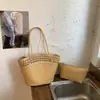 Bolso tipo cesta con diseño calado de nicho transfronterizo, nuevo bolso cubo de moda para principios de otoño de 2026, bolso versátil casual para el día a día