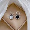 [acero de titanio de cuerpo completo] Pendientes minimalistas de viento de Fritillaria Trébol de la Suerte fríos para hombre y mujer, temperamento de personalidad, pendientes de banquete