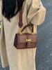 Bolso bandolera de diseño nicho a cuadros Nuevo otoño e invierno 2023 con correa de hombro ancha ajustable bolso de mano moda bolso de mujer