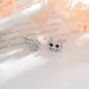 Pendientes Creativos de Pata de Gato Gu Mao Ning Mini para Mujer 2026 Nueva Tendencia Lindos Tachuelas Asimétricas de Oreja de Gato