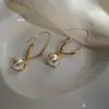 Pendientes Metálicos de Frijol con Aguja de Plata Galvanizada en Oro Real Pendientes Sencillos de Nicho Joker Pendientes de Lujo Ligero de Gama Alta para Mujer Venta al por Mayor