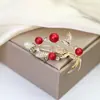 Broche Transfronterizo Nuevo de Alta Gama Lazo Insecto Flor Femenino Anti-Exposición Fijo Ropa Versátil Corsage
