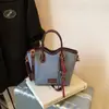 Bolsa Pequena de Mão Simples Transfronteiriça Feminina de Nicho Bolsa Saco Transversal Moda Outono 2025 Versátil Bolsa para o Dia a Dia