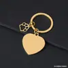 Llavero de Pata de Perro Hueca Transfronterizo Metal Forma de Corazón Impresión Láser Color Material en Blanco Regalo de Vacaciones Llavero Grabado