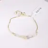 Venta Caliente Mariposa Aguja de Plata Aretes Nuevos Aretes Pulsera Collar Tienda de Accesorios Yiwu Venta al por Mayor