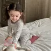 Conjunto de Roupa de Casa Sem Costura de Algodão Puro com Lycra Outono/Inverno 2026 para Crianças Meninos Meninas Bebê Blusa de Outono Calças de Outono Conjunto de Pijama
