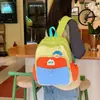 Mochila infantil nueva con bloques de color, linda y ligera, adecuada para estudiantes de primaria, niños y niñas, mochila para viajes de bebés y jardín de infantes