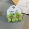 Dufei Amine Estilo Francés Pequeños Frescos Simples Aretes de Flores de Gota de Aceite Moda de Lujo Accesible Aretes de Flores de Perlas Venta al por Mayor de Aretes
