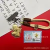 Llavero de Hilo Rojo de Oro Puro 999 de una Pieza para Dropshipping, Exquisito Regalo de Tienda de Alta Gama, Llavero del Dios de la Riqueza