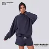 Conjunto de ropa europea y americana para mujer transfronterizo: sudadera casual y shorts, sudadera holgada de forro polar color liso, cuello medio alto, estilo 'dopamine hot girl'