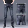 Jeans Masculino de Seda Gelada de Verão Slim Reto Novo 2025 Elástico Casual Ultra-Fino Calça Longa Estilo Fino de Verão