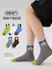 Calcetines Infantiles al por Mayor 1964 Primavera/Verano 2026 Estilo Delgado Capitán Perro Algodón Malla Transpirable Calcetines para Niños