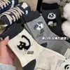 Calcetines de hilo con estampado de dibujos animados para mujer, calcetines de media pantorrilla, estilo otoño e invierno, tendencia coreana ins, terciopelo de felpa, calcetines largos lindos para primavera y otoño