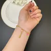 Nuevo Estilo Chino Pulsera de Arena Dorada Vietnamita Estilo Pastoral Rosa Goteo de Aceite Mariposa Borla Flor Pulsera Joyería Versátil Retro