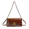 Nova Bolsa de Ombro Sela Retrô Versátil Outono/Inverno 2025 Design de Nicho Bolsa Transversal com Corrente Fashion Bolsa para o Dia a Dia