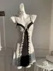 Vestido Transfronterizo Europeo y Americano Estilo Chica Pura Deseo 2026 con Estampado, Cintura Ajustada, Sin Tirantes, Cuello en V Profundo y Bordes con Volantes