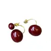 Pendientes de bola redonda roja Ankora, Lujo ligero, Pendientes exquisitos y de alta gama, Pendientes de nicho modernos y elegantes para mujer