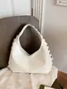 Bolso de hombro de luna tachonado con diseño de nicho estilo coreano, nuevo estilo moderno y genial 2026, bolso de mano con correa ancha para el hombro, bolso de axila