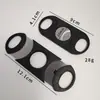 Cortador de cigarros de plástico de cabeza redonda con 26 agujeros, tijeras afiladas para cigarros, pinzas cortadoras de cigarros portátiles creativas, abridor de agujeros y cortador