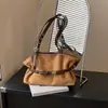 Bolso de mano versátil de nicho 2026 estilo commuter retro bajo el brazo para mujer de terciopelo de un solo hombro moda otoño/invierno bolsa de gamuza nuevo estilo