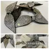 Flor de zapato con pedrería al por mayor Pasador para ropa y cabello Accesorios de bricolaje Accesorios Pedrería Super Brillante Estéreo Lazo