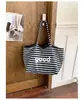 Bolsa de Tote Rayada Casual Versátil de Doble Cara para el Hombro 2026 Nueva Bolsa para Viajes Salidas Viaje al Trabajo