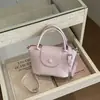 Diseño moderno, simple, gran capacidad, texturizado, estilo coreano, color liso, nuevo modelo 2026, bolso bandolera con colgante de bola de masa para mujer