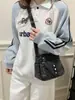 Bolso de mezclilla para mujer, simple y casual, nuevo bolso de mano de moda 2026, bolso de hombro versátil casual, bolso cruzado