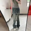 Jeans Retro de Calle Rasgados de Pierna Micro-Acampanada para Mujer Otoño 2026 Pantalones Rectos Delgados Adelgazantes Acampanados