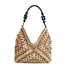 Bolsa de palha estilo coreano para o verão para mulheres, perfeita para férias na praia, apresentando um design vazado, estilo sacola de ombro único e alça trançada