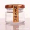 Botella de vidrio mini de 25 ml de capacidad pequeña para estofado fresco de nido de pájaro de primera calidad con tapa de hojalata, adecuada para gelatina de piel de burro y miel, frasco de vidrio sellado