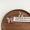 Pendientes de plata 925 con forma de mariposa y circonita hueca, estilo francés, con temperamento de hada súper elegante y delicado estilo de hada.