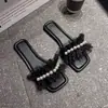 Moda transfronteriza temperamento versátil sin cordones estilo coreano verano 2026 nuevo estilo hada de encaje perla chanclas mujer